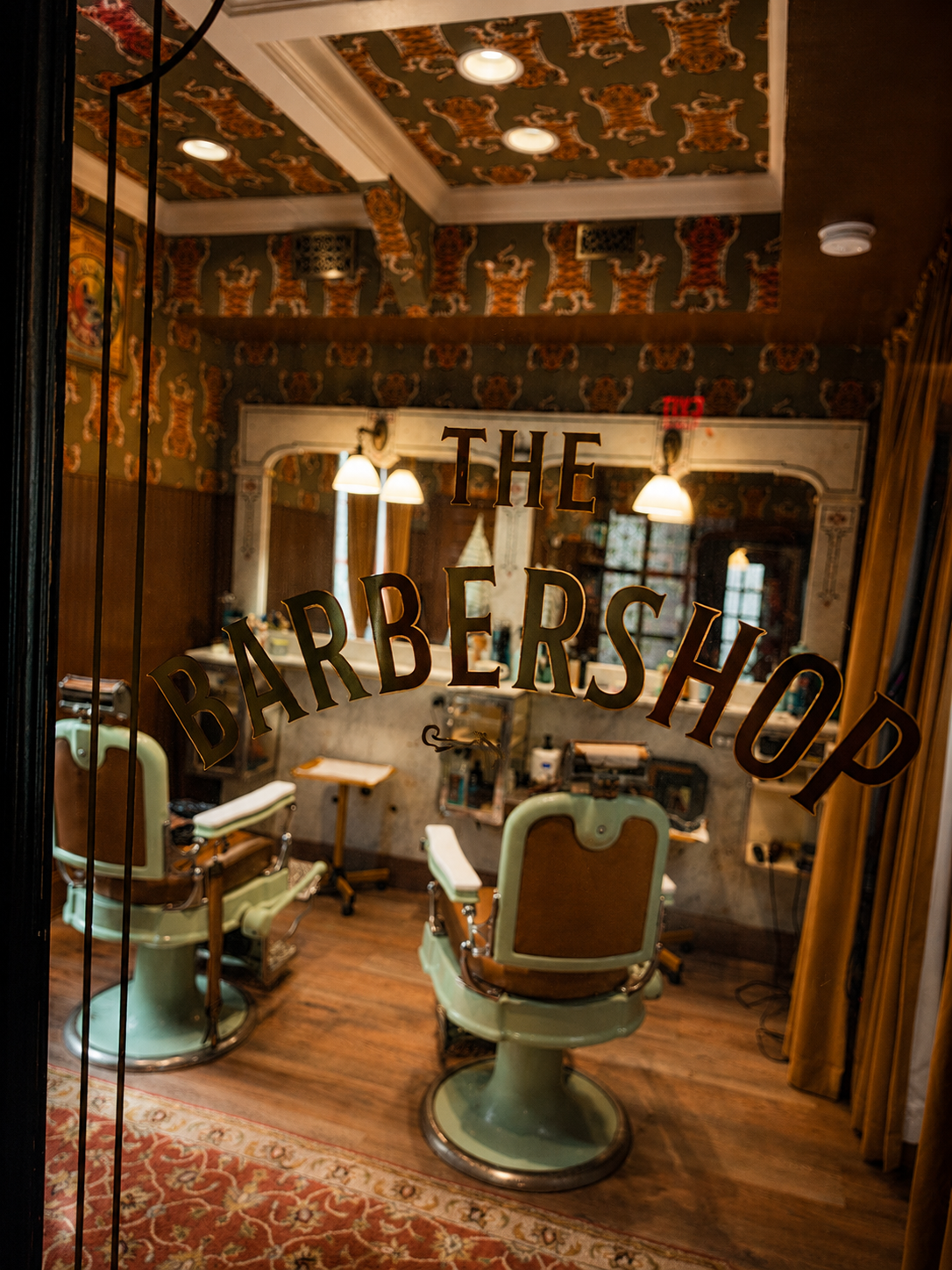 The Barbershop — gilded signage at LaSala's